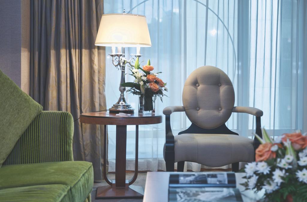 Wiseman Grand Hotel Доха Экстерьер фото A living room at the hotel