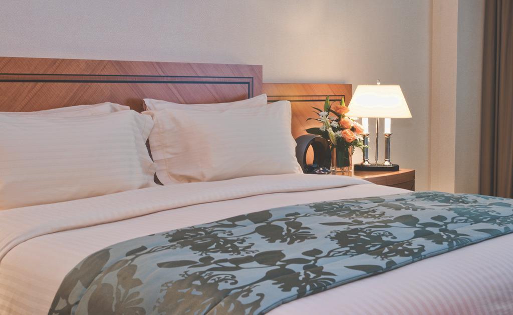 Wiseman Grand Hotel Доха Экстерьер фото A bed runner
